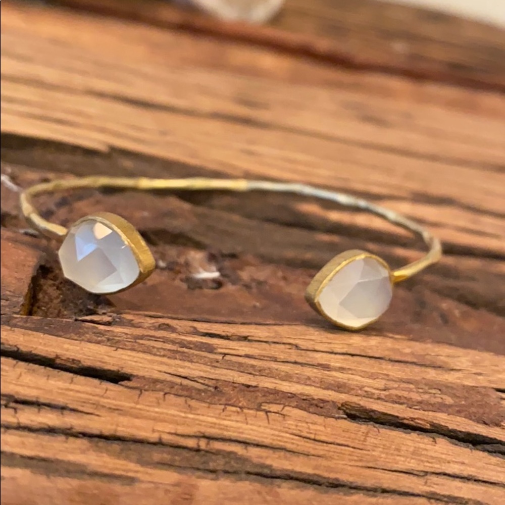 Gold cuff bracelet with gems